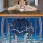 Photo montage of a child eating octopus soup with feet underwater