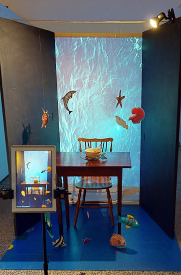 a photo booth with an underwater setting